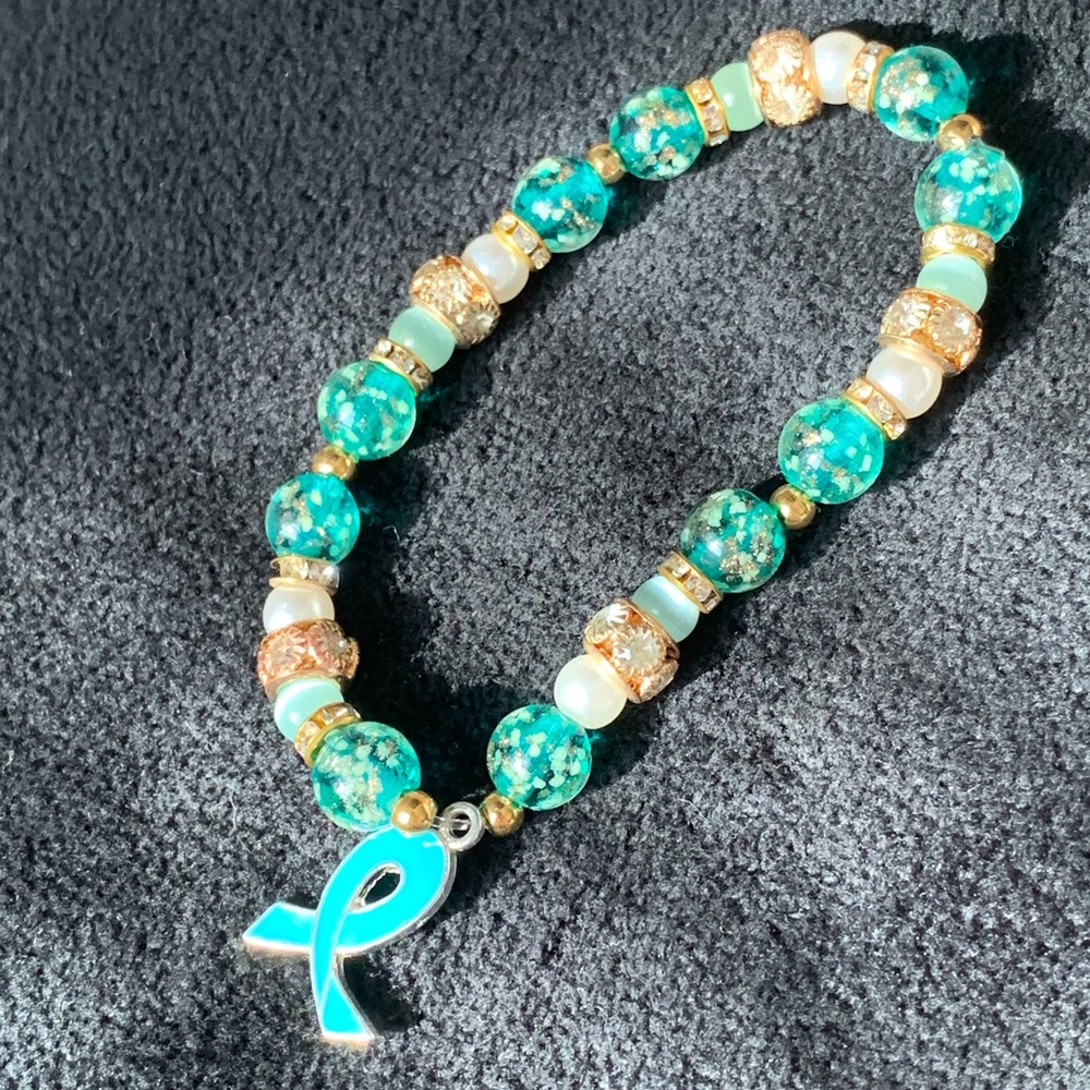 Teal and gold awareness bracelet